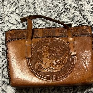 Stunning, unique, vintage hand tooled leather purse.